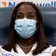 Image for article titled ICU Nurse Receives First Public Covid-19 Vaccine In U.S., Got a Cool Sticker Too